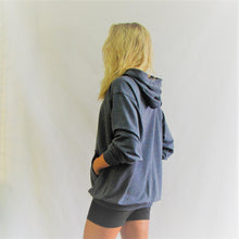 Load image into Gallery viewer, Denim blue bamboo cotton hoodie with a roomy cut. The fabric is soft against your body. Made in Canada.