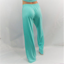 Load image into Gallery viewer, Coral coloured bamboo cotton women's lounge pant. High waisted and  roomy leg cut. Made in Canada.