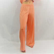 Load image into Gallery viewer, Coral coloured bamboo cotton women's lounge pant. High waisted and  roomy leg cut. Made in Canada.