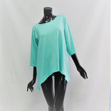 Load image into Gallery viewer, Caribbean blue casual top for women. Made from bamboo and cotton, very soft to touch.  Boat neck , 3/4 sleeve length and a curved hemline. Cut and Sewn in Canada.