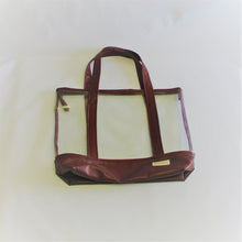 Load image into Gallery viewer, All year round beach bag. UV marine grade clear tote. Brown leather look  bottom and straps. You can use it everyday because it is easily cleaned.