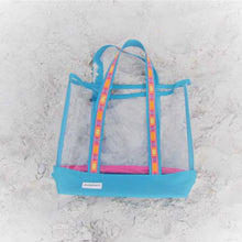 Load image into Gallery viewer, Summer beach bag. UV marine grade clear tote that you can see everything inside. Turquoise edging and bottom with a brightly coloured ribbon added to the straps. 