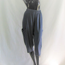 Load image into Gallery viewer, denim coloured capris on a dark coloured manikin