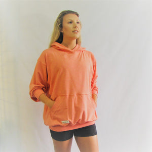 Coral coloured bamboo cotton hoodie. Very soft and great for a walk on the beach. Cut and sewn in Canada.