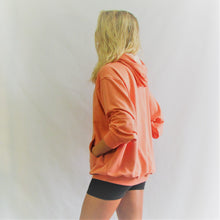 Load image into Gallery viewer, Coral coloured bamboo cotton hoodie. Very soft and great for a walk on the beach. Cut and sewn in Canada.
