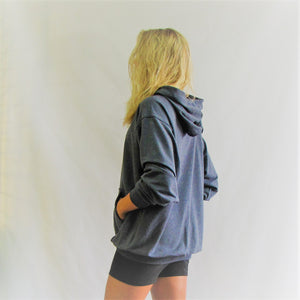 Denim blue bamboo cotton hoodie with a roomy cut. The fabric is soft against your body. Made in Canada.