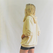 Load image into Gallery viewer, Almond coloured bamboo cotton hoodie. Soft and roomy. This really shows of the tan. Made in Canada.