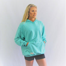 Load image into Gallery viewer, Caribbean blue bamboo cotton hoodie. This is so soft and great to walk the beach in. Made in Canada.