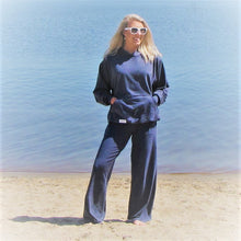 Load image into Gallery viewer, Denim blue women&#39;s lounge pant with matching hoodie. The bamboo and cotton fabric is so soft and comfy. Perfect for a cool summers night. Cut and sewn in Canada.