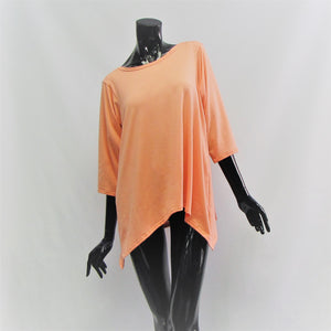 Coral coloured woman's bamboo cotton lounge top. Boatneck , 3/4 sleeves and hemline is longer on sides. Cut and sewn in Canada.