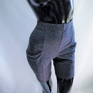 bike shorts made with grey black heather material on a manikin  